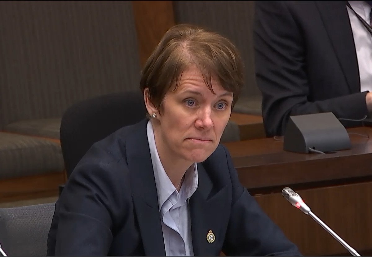 Erin O’Gorman at the committee table while a question is put to her