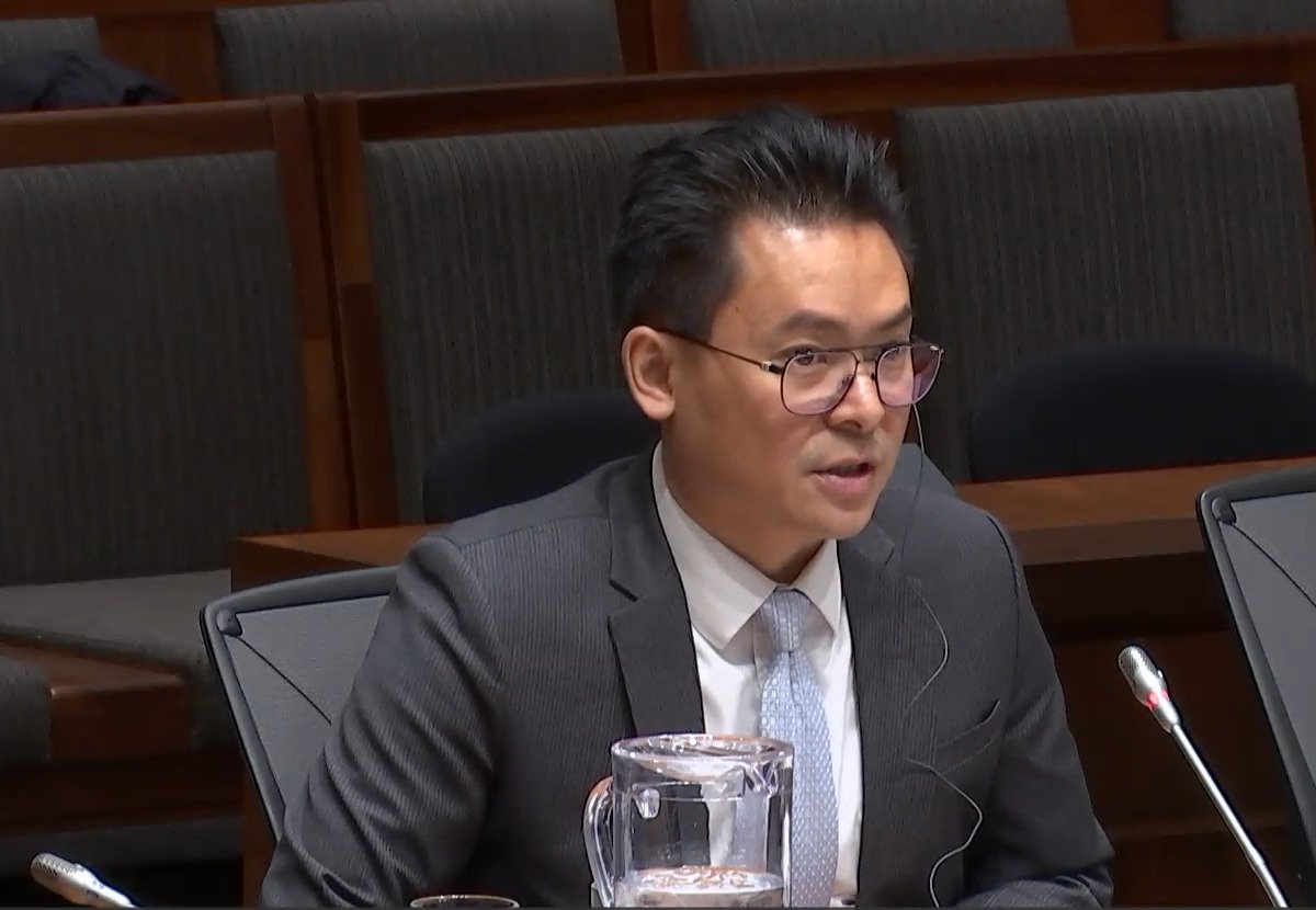 Minh Doan at the committee table, mid-sentence